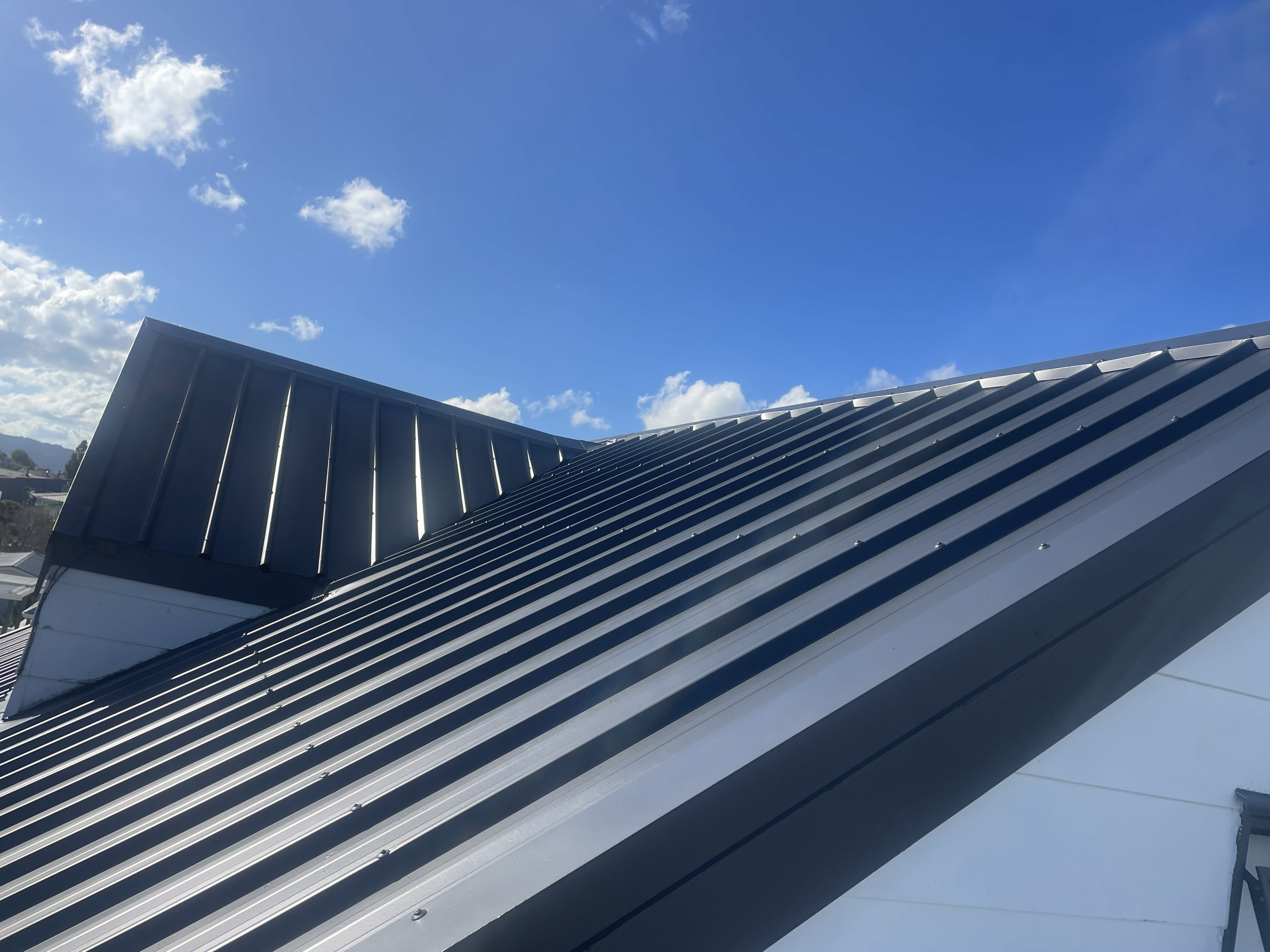 iron roof repaired and recoated by Northland Roof Coatings recently, a stunning finished result.